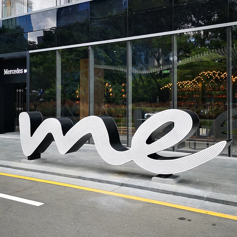 Installed custom exterior signage and wayfinding example